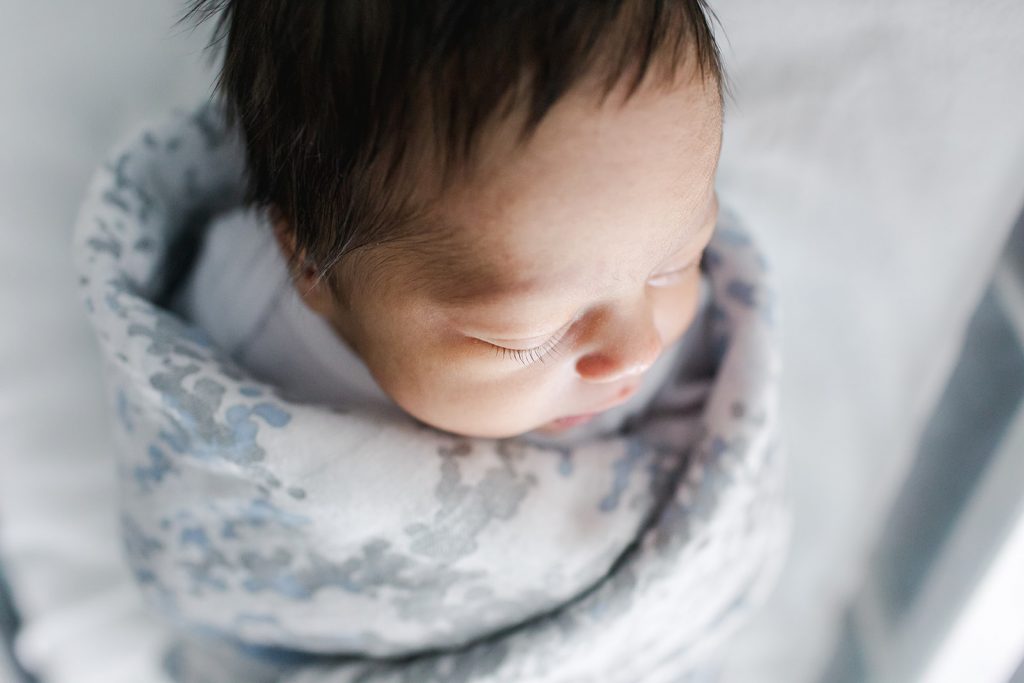 Close-up photo of newborn baby's eyelashes.