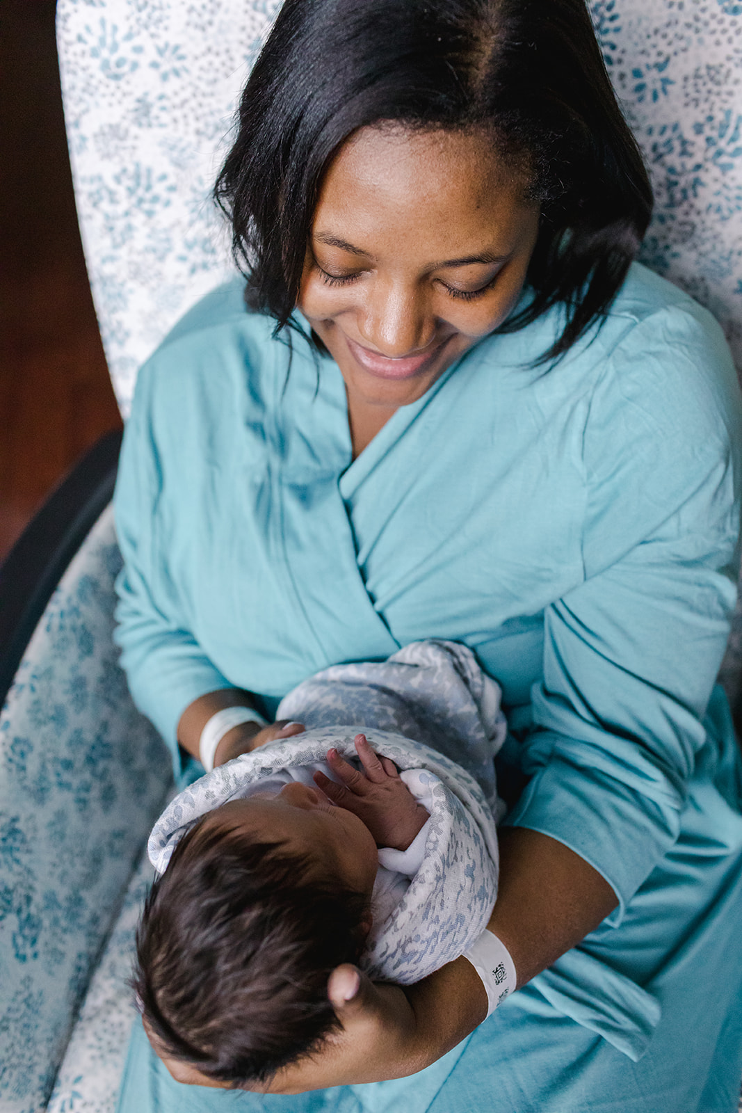 Mother holding newborn baby