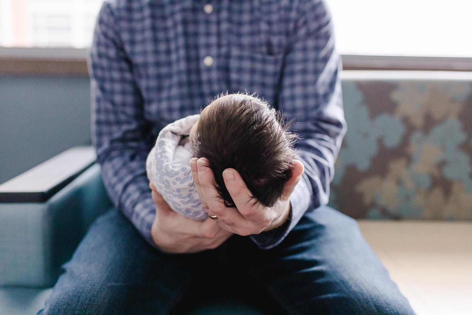 New father holding his baby