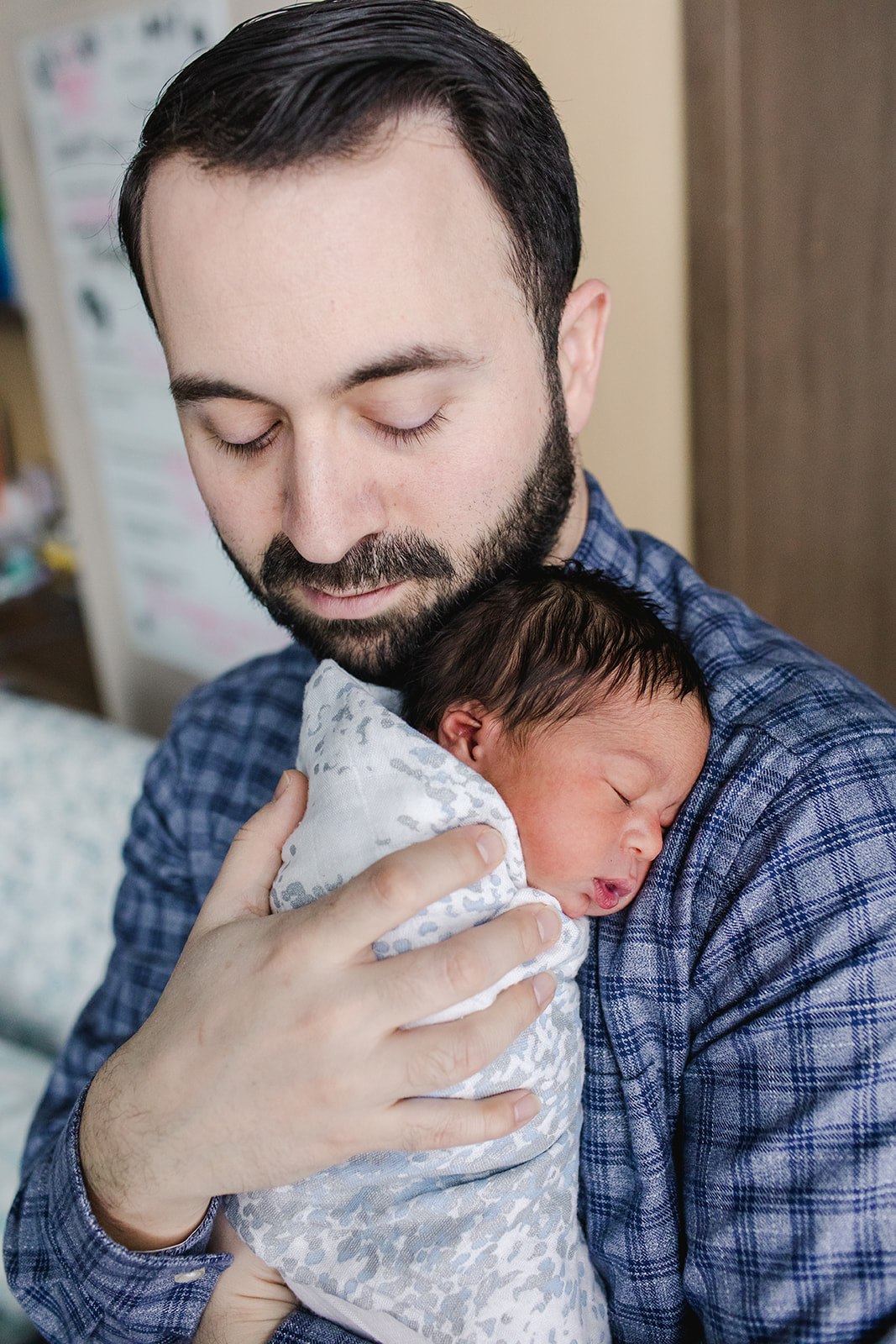 Father with newborn baby