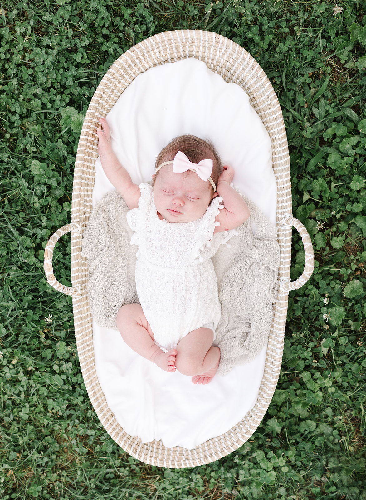 Baby in a Moses basket