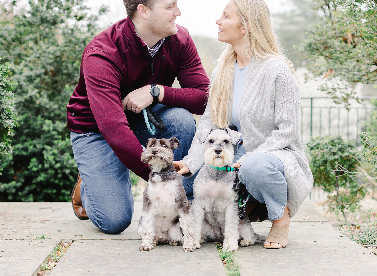 couple together with their two dogs