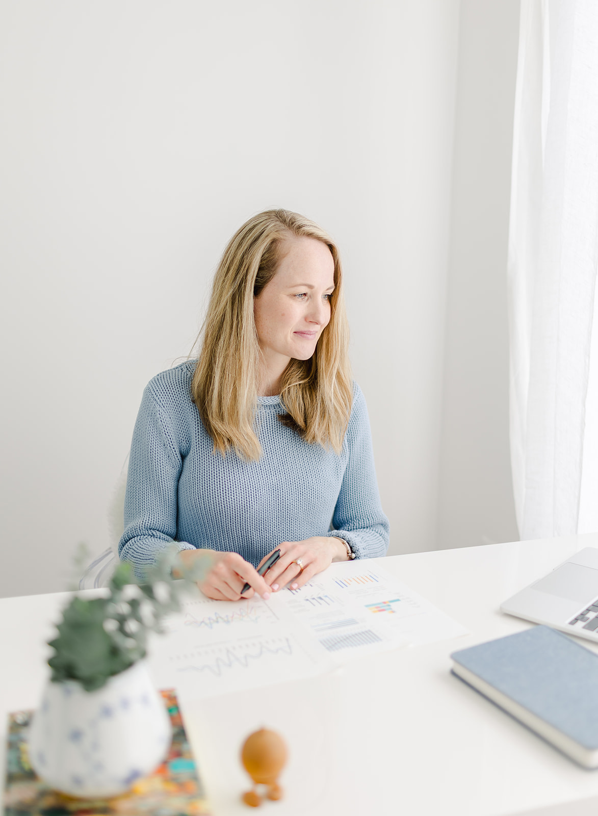 headshot of a woman working in an office