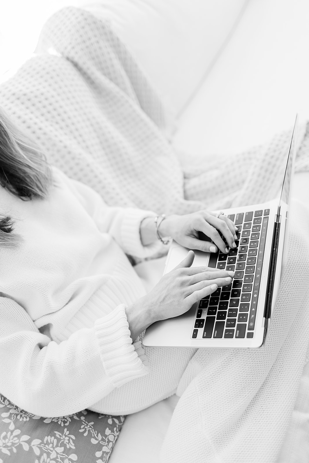 woman typing on the computer